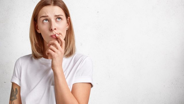 Woman thinking plethora
