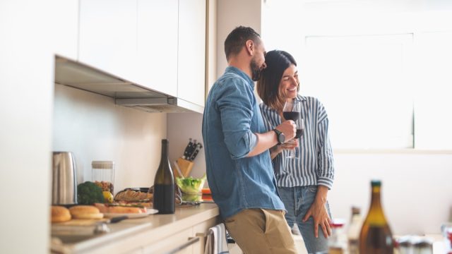 couple enjoying date night at home - at-home date night ideas