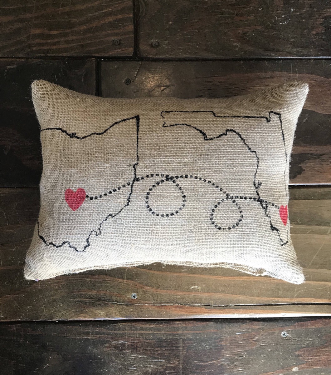 burlap pillow with the outline of two states on it, best friend gifts