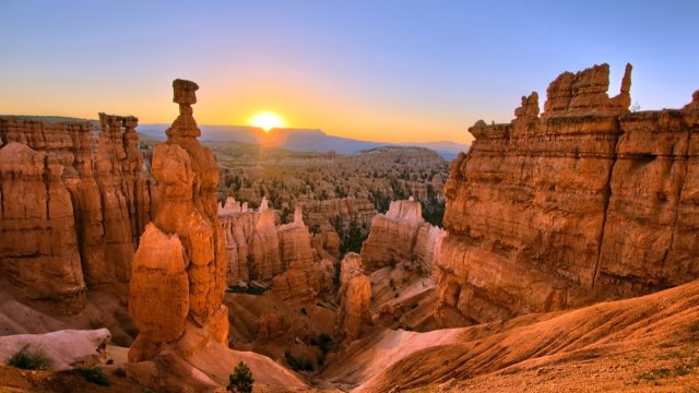 The sun rising above Thor's Hammer at Bryce Canyon National Park, Utah.