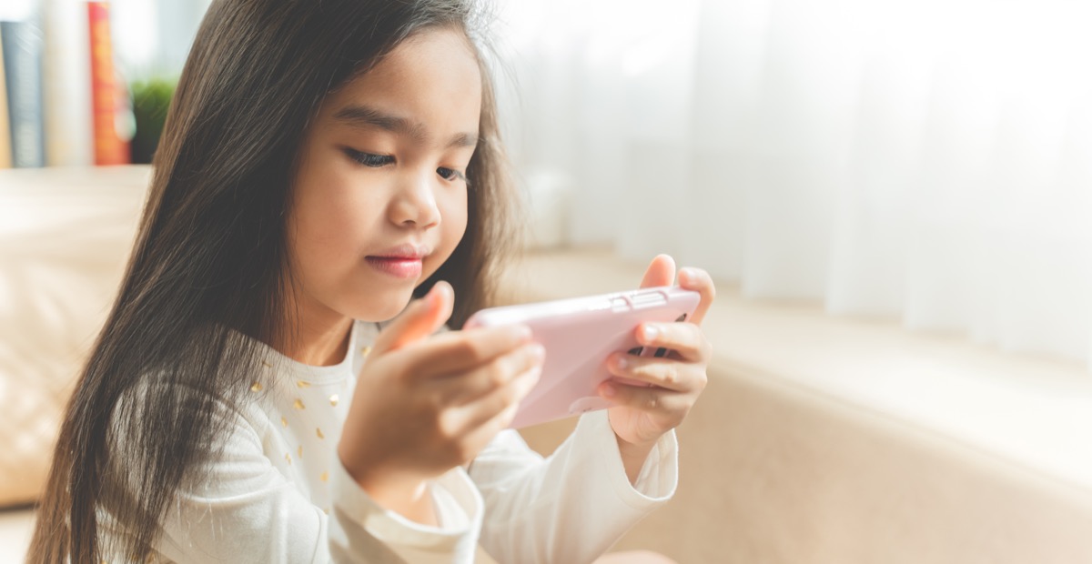 child on phone old-fashioned manners