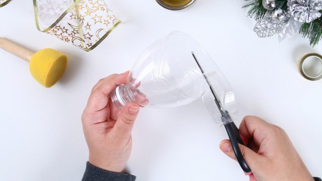 Person Doing Crafts With a Water Bottle Water Bottle Second Uses