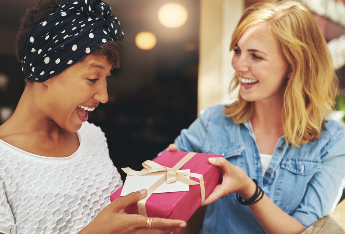 woman giving her friend a gift, best friend gifts