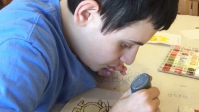 Danniel Dubin, autistic boy whose Dragon Tales plate broke