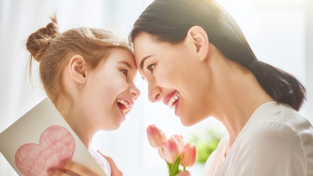 mother and daughter with heads together, mother daughter gifts