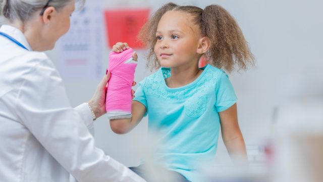Little Girl at the Doctor's Office with a Broken Arm Health Hazards Kids