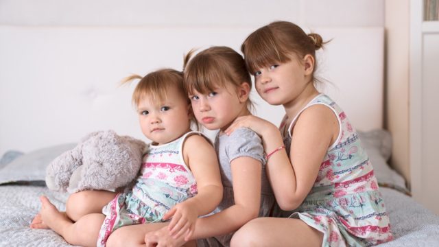 Middle child frowning