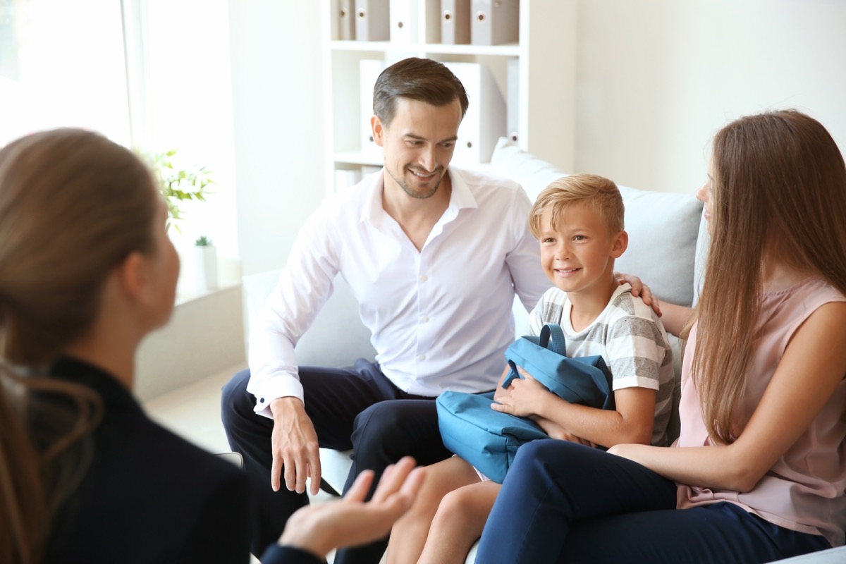 parent teacher conference with young child lies teachers tell parents