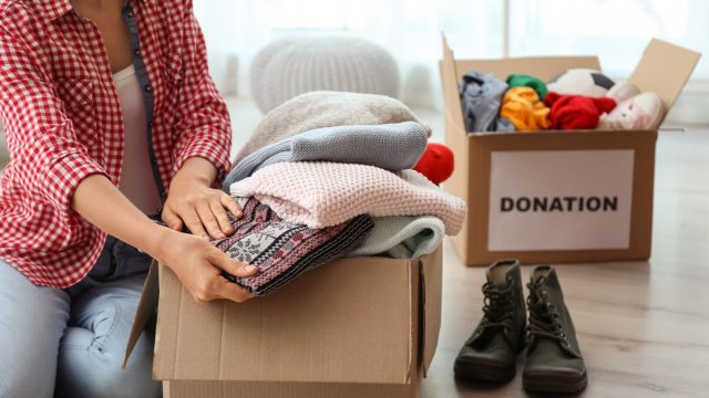 woman clearing out clutter