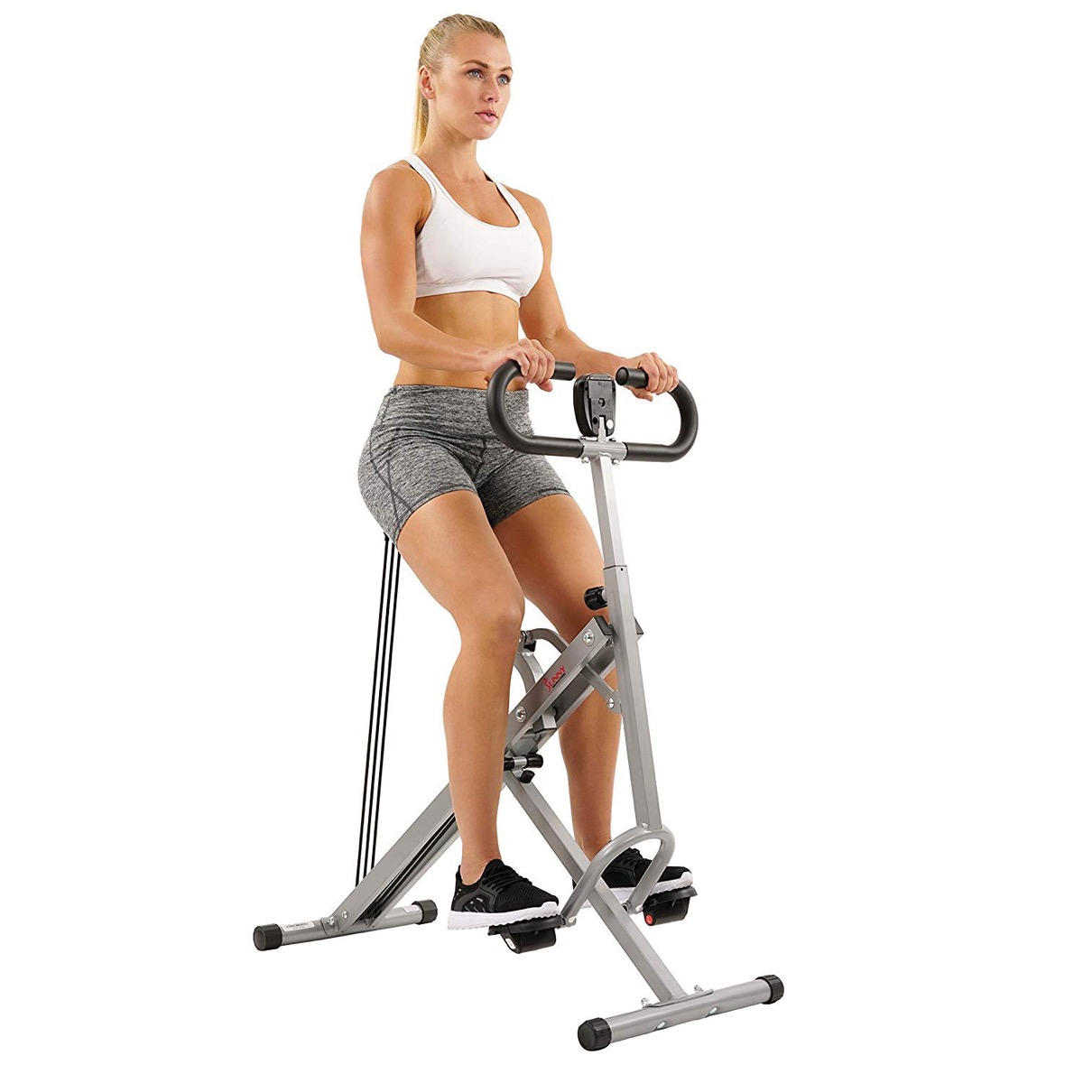 Woman on fitness machine