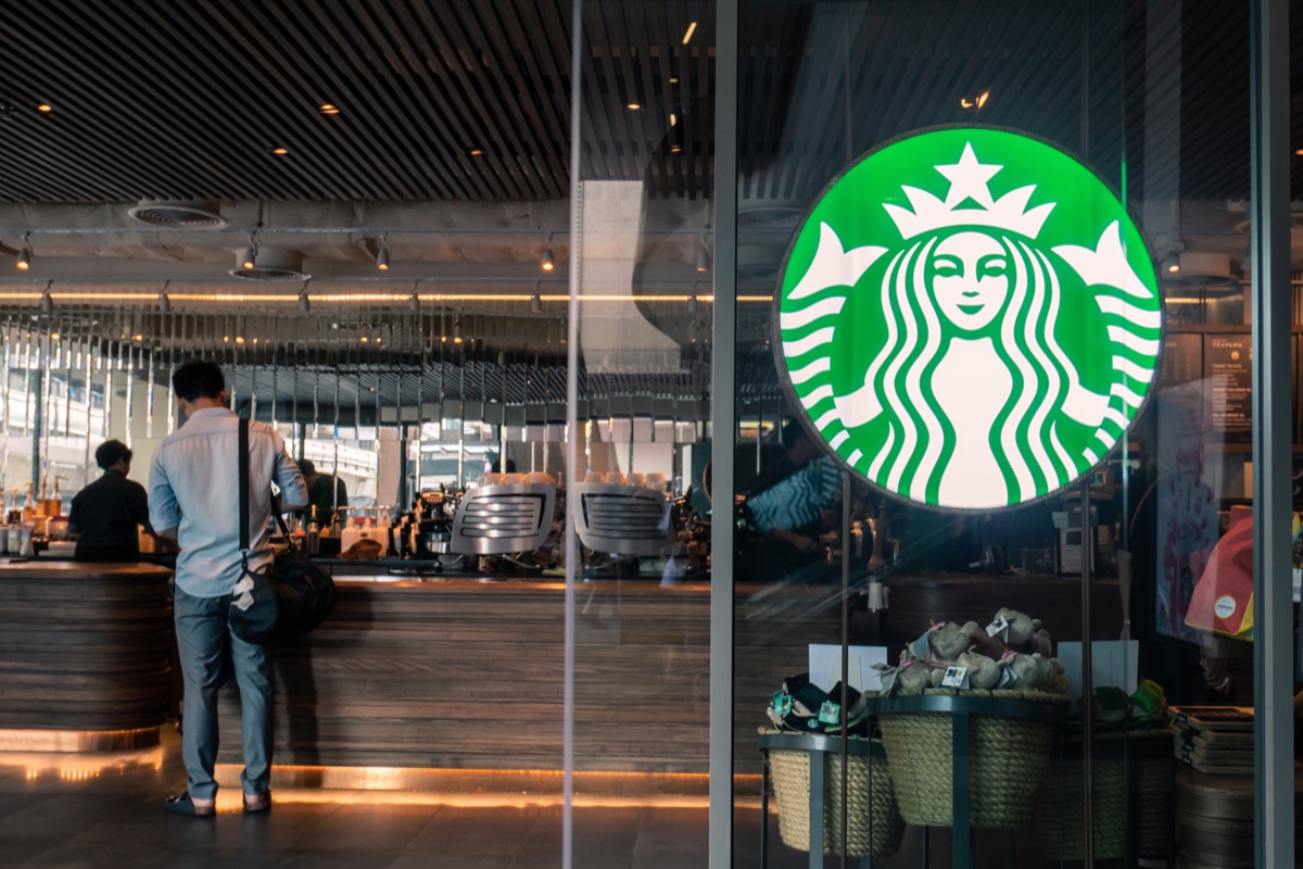 Starbucks coffee logo in front of shop