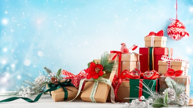 Christmas or New Year background with festive gift boxes