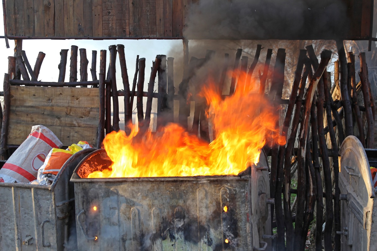 a dumpster that is on fire