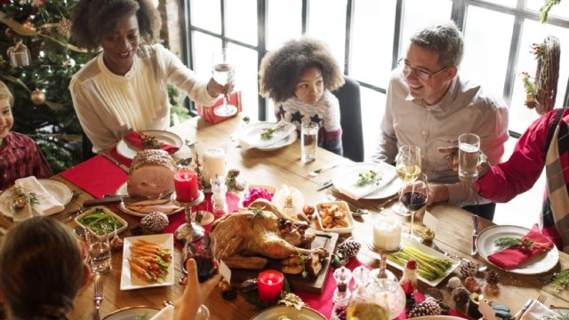 multiracial family celebrating christmas together