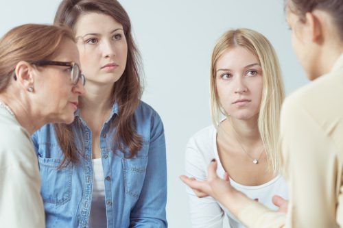 people having a serious conversation