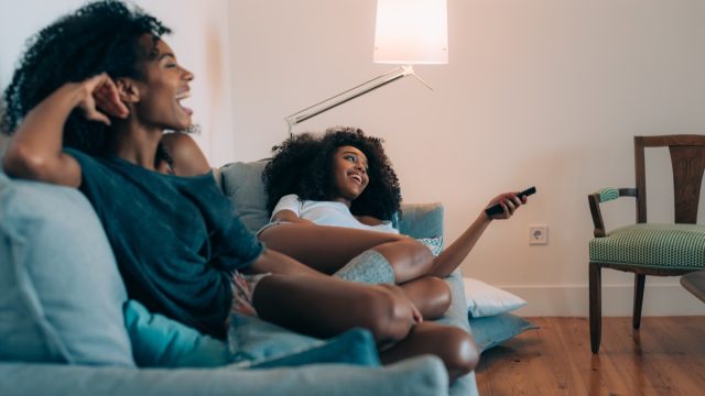 two women watching tv