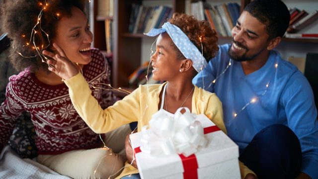 Family of three celebrating Christmas