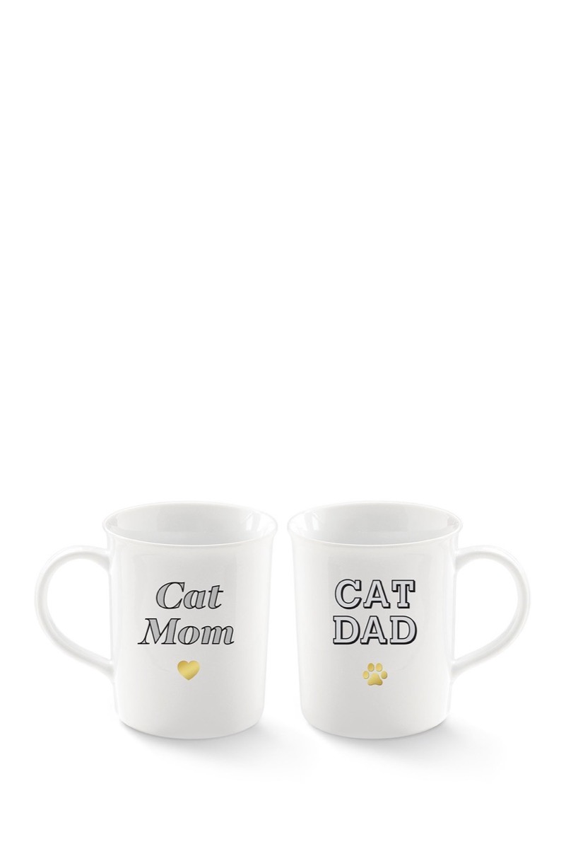 white ceramic mugs with "cat mom" and "cat dad" on them