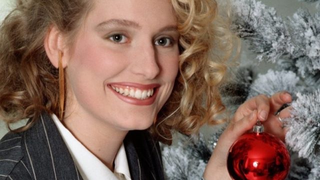 1980s Teenager decorating christmas tree