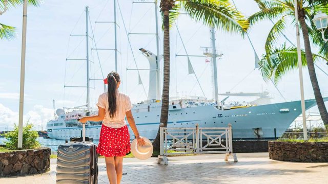 Cruise travel passenger going on board