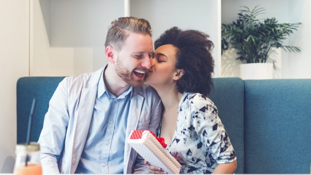 interracial couple kissing on Valentine's Day