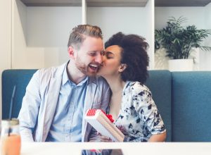 interracial couple kissing on Valentine's Day