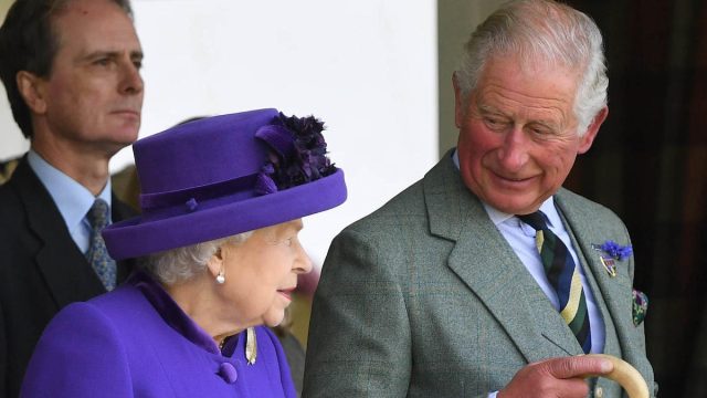Queen Elizabeth II attends The Braemar Gathering with Prince Charles, The Prince of Wales, in 2019