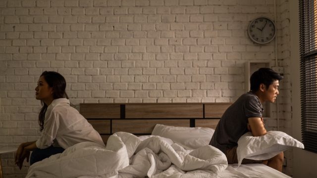 Couple fighting in bedroom