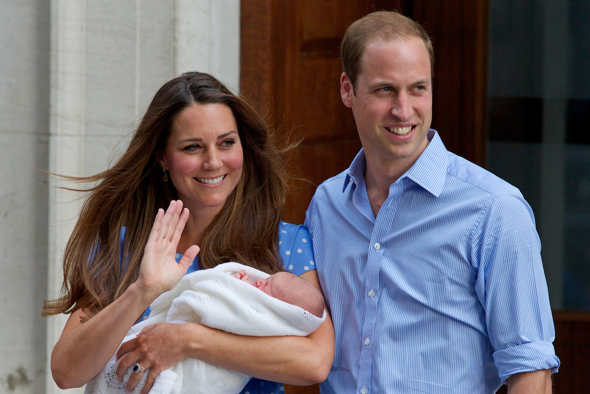 Prince William and Catherine, Duchess of Cambridge show their new-born baby boy to the world's media, standing on the steps outside the Lindo Wing of St Mary's Hospital in London on July 23, 2013.