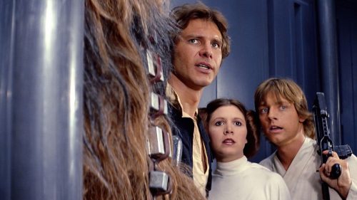 Harrison Ford as Han Solo, Carrie Fisher as Princess Leia, and Mark Hamill
