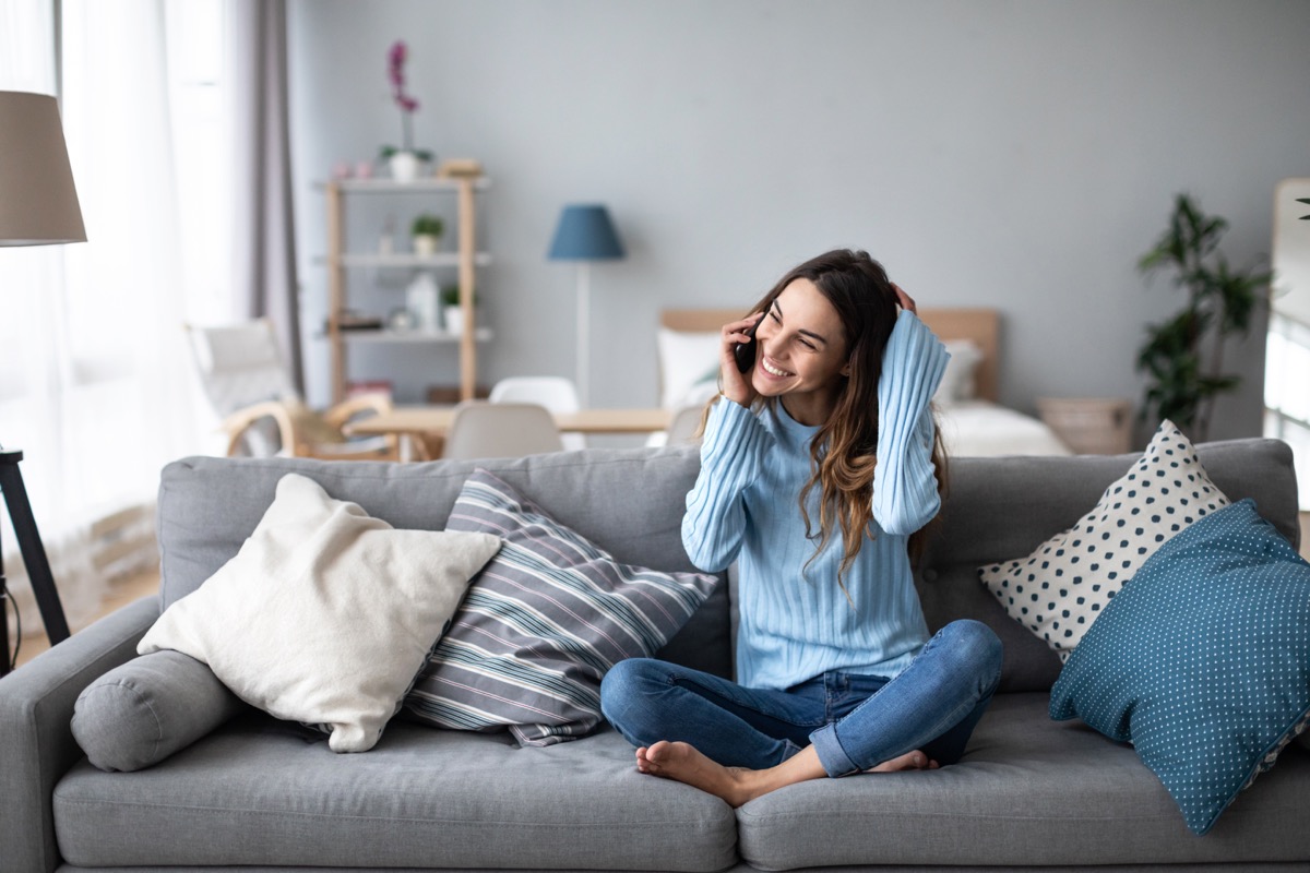 Woman smiling on the phone