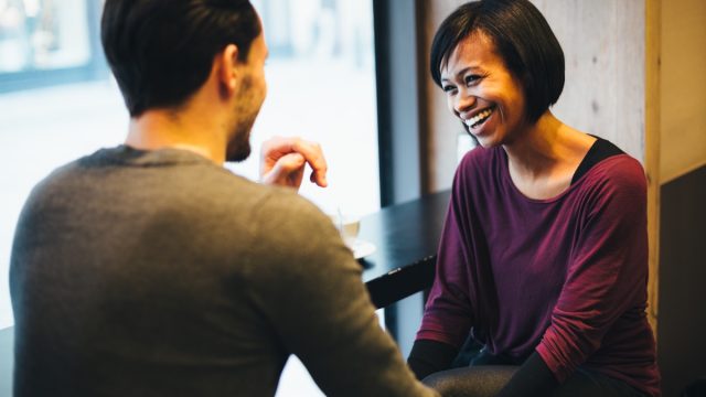 Couple laughing on a date