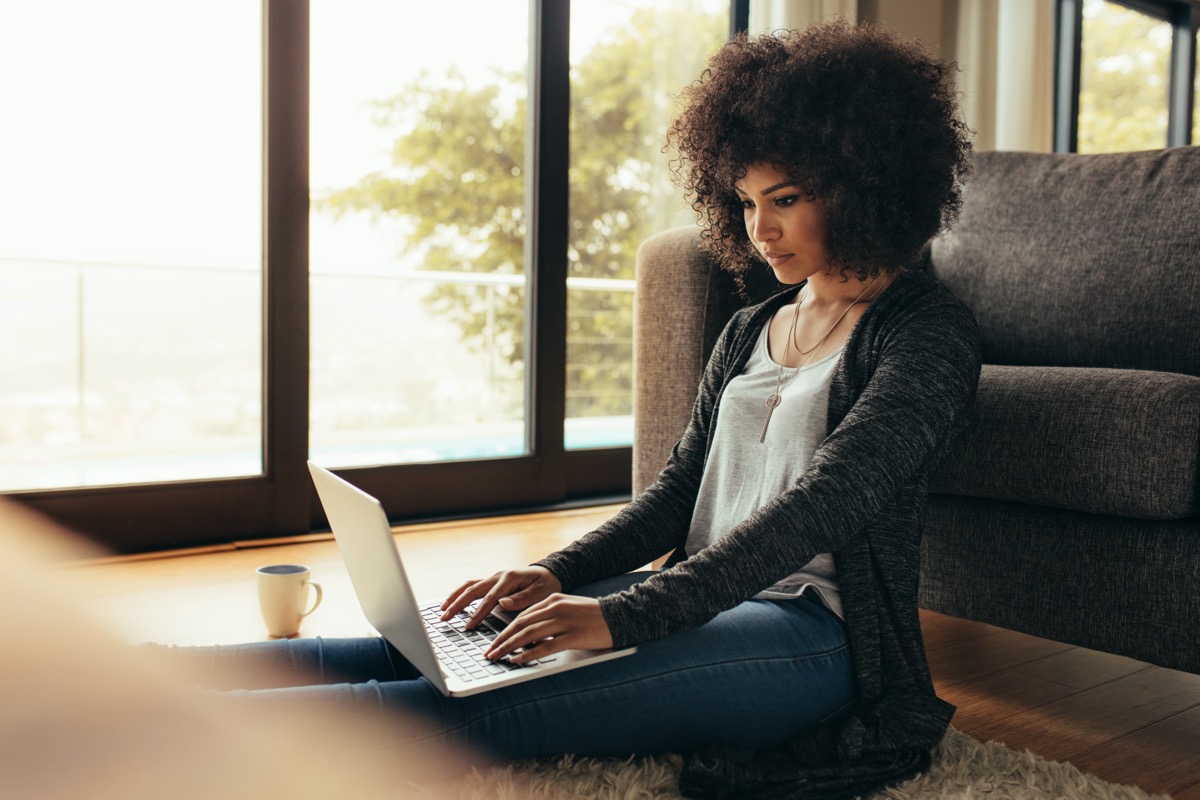 young black woman using laptop