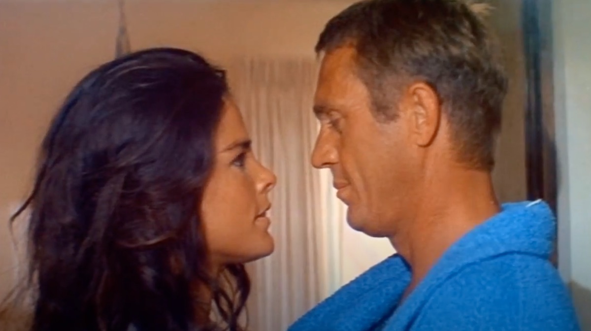 ali macgraw and steve mcqueen about to kiss in "the getaway"