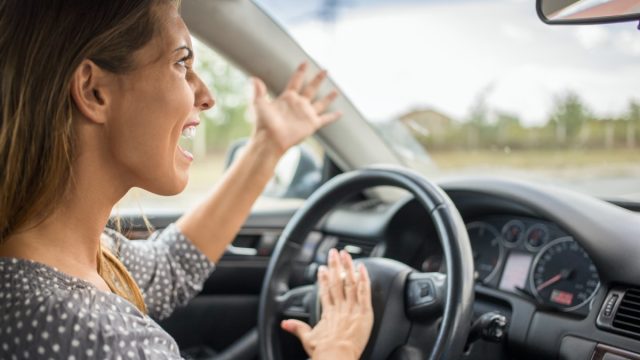 angry white woman driving car