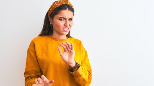 woman showing disgust