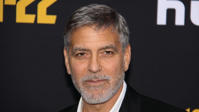 George Clooney wears a black suit at the premiere of "Catch-22" in 2019