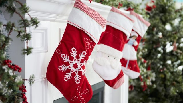 red christmas stockings on mantle