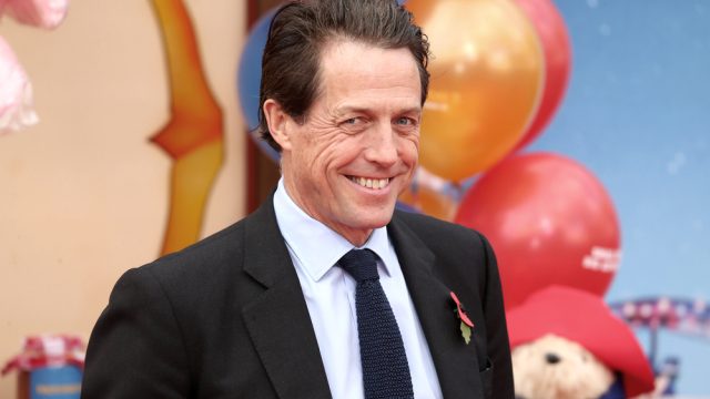 hugh grant on the red carpet