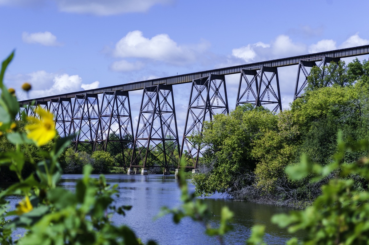 bridge runs over the valley and next to trees in Valley City, North Dakota