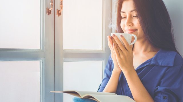 young woman drinking coffee