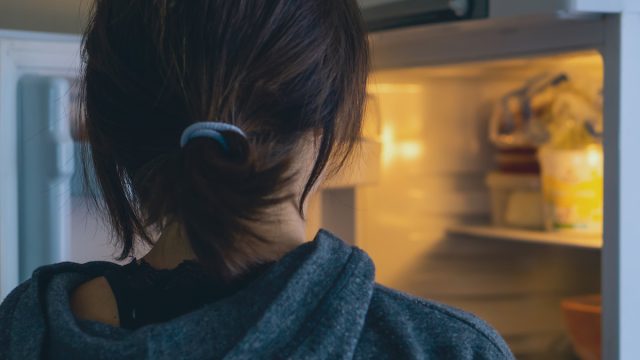 woman-looking-in-fridge