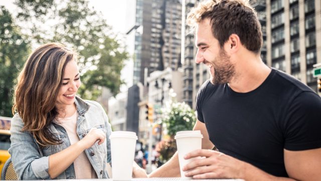 Man and woman flirting