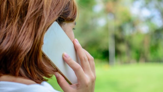 Woman on the phone outside