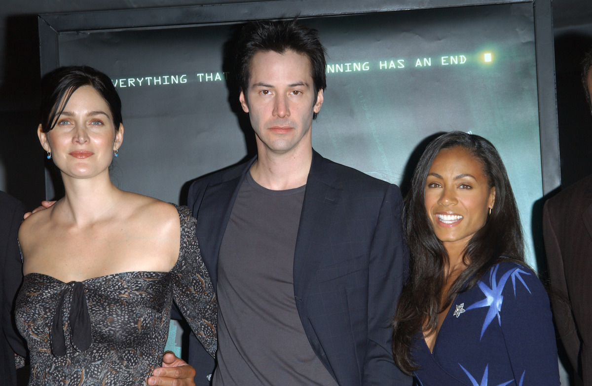Carrie-Anne Moss, Keanu Reeves, and Jada Pinkett Smith at a press conference for "The Matrix Revolutions" in 2003