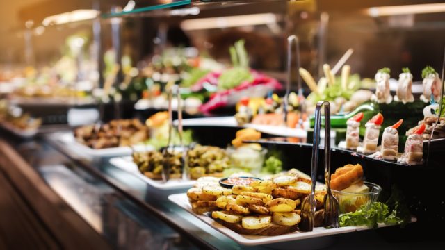 buffet restaurant warming trays full of food