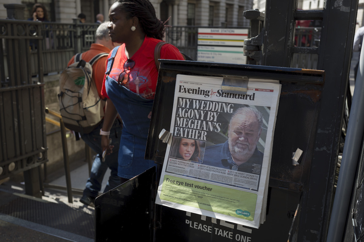 Evening Standard headlines with news of Meghan Markle's father not attending the upcoming royal wedding between the American actor and prince Harry, at Bank underground station in the City of London, the capital's financial district aka the Square Mile, on 15th May 2018, in London, UK.