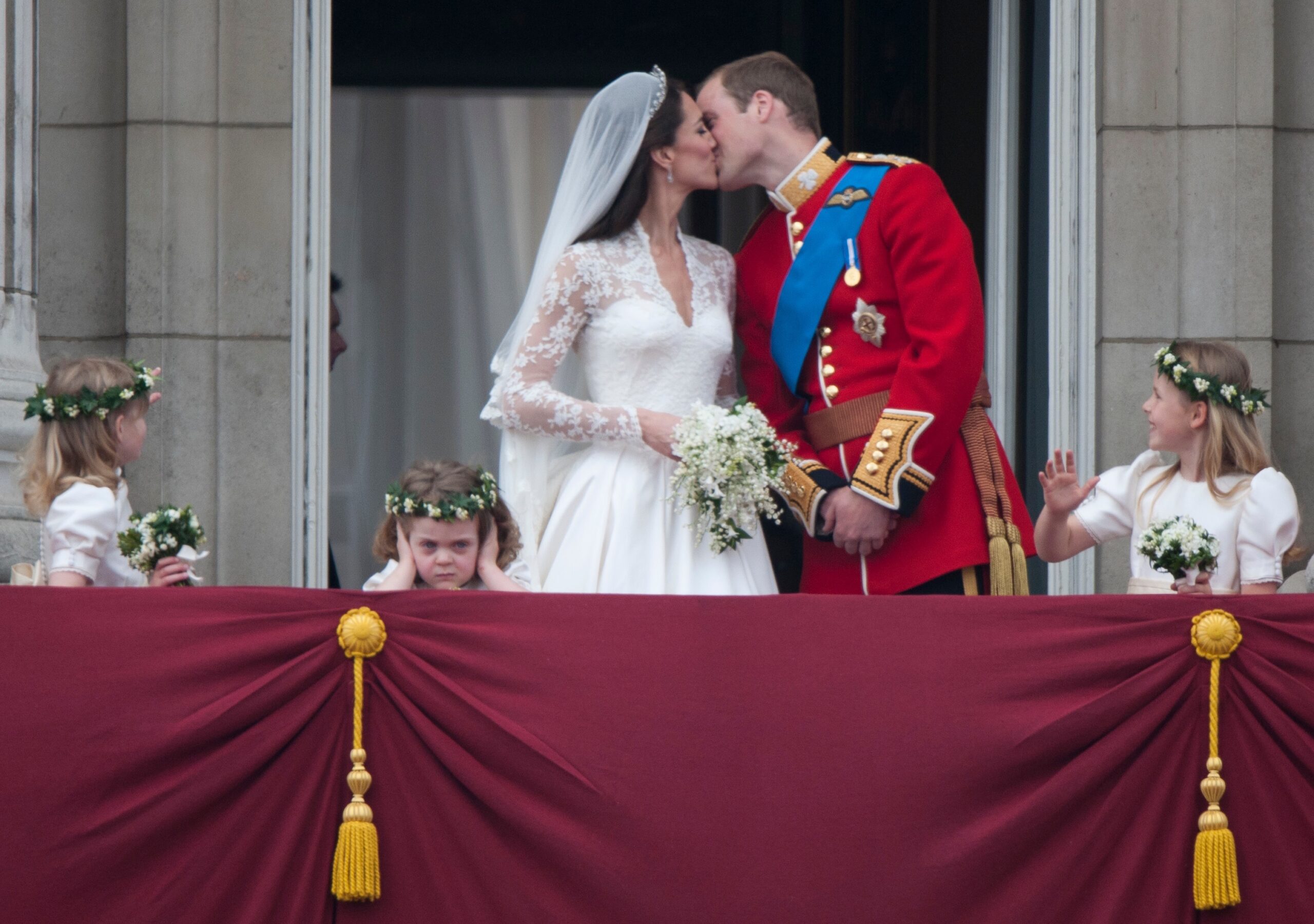 Prince William and his wife Kate Middleton, who has been given the title of The Duchess of Cambridge, on the balcony of Buckingham Palace, London with bridesmaids Margarita Armstrong-Jones (right) and Grace Van Cutsem (middle) and Lady Louise (left), following their wedding at Westminster Abbey.