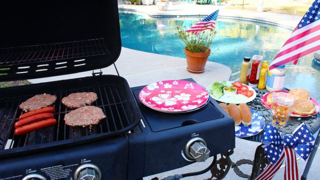 Gas grill by the swimming pool, ready to bbq