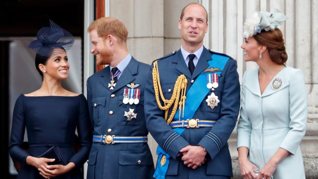 Meghan, Duchess of Sussex, Prince Harry, Duke of Sussex, Prince William, Duke of Cambridge and Catherine, Duchess of Cambridge watch a flypast to mark the centenary of the Royal Air Force from the balcony of Buckingham Palace on July 10, 2018 in London, England.